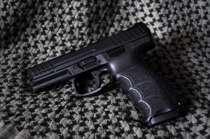 Heckler_&_Koch_SFP9_handgun_on_neutral_background